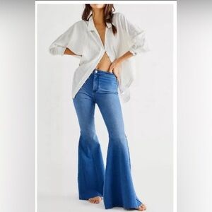 Free People, We the Free, size 32 Float On Flares 70’s blue color